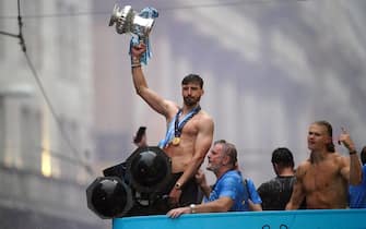 Manchester City's Ruben Dias with the FA Cup Trophy during the Treble Parade in Manchester. Manchester City completed the treble (Champions League, Premier League and FA Cup) after a 1-0 victory over Inter Milan in Istanbul secured them Champions League glory. Picture date: Monday June 12, 2023.