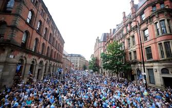 Manchester City fans during the Treble Parade in Manchester. Manchester City completed the treble (Champions League, Premier League and FA Cup) after a 1-0 victory over Inter Milan in Istanbul secured them Champions League glory. Picture date: Monday June 12, 2023.