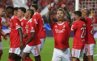 epa10165479 Benfica's Alejandro Grimaldo (3-R) celebrates after scoring the 2-0 lead during the UEFA Champions League group H soccer match between SL Benfica and Maccabi Haifa in Lisbon, Portugal, 06 September 2022.  EPA/TIAGO PETINGA