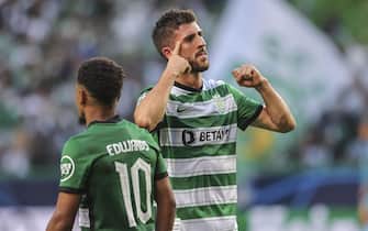 epa10182056 Sporting player Paulinho (R) after scoring the opening goal in the UEFA Champions League group D soccer match between Sporting CP and Tottenham Hotspur held at Alvalade Stadium in Lisbon, Portugal, 13 September 2022.  EPA/MIGUEL A. LOPES
