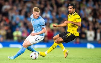 Kevin De Bruyne of Manchester City holds the ball up from Emre Can of Borussia Dortmund during the UEFA Champions League Group D match between Manchester City and Borussia Dortmund at the Etihad Stadium, Manchester
Picture by Matt Wilkinson/Focus Images/Sipa USA 
14/09/2022