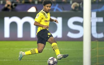 epa10469266 Karim Adeyemi of Dortmund scores the 1-0 lead during the UEFA Champions League Round of 16, 1st leg match between Borussia Dortmund and Chelsea FC in Dortmund, Germany, 15 February 2023.  EPA/Friedemann Vogel