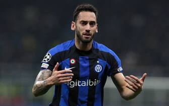 MILAN, ITALY - FEBRUARY 22: Hakan Calhanoglu of FC Internazionale, in action, looks on during the UEFA Champions League round of 16 leg one match between FC Internazionale and FC Porto at San Siro Stadium on February 22, 2023 in Milan, Italy. (Photo by Emilio Andreoli - Inter/Inter via Getty Images )
