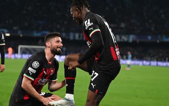 Rafael Leao of AC Milan and Olivier Giroud celebrating after a goal during the UEFA Champions League quarter finals second leg match between SSC Napoli and AC Milan on 18 of Avril 2023 at Diego Armando Maradona stadium in Naples, Italy. Photo Tiziano Ballabio