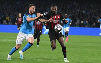 UEFA Champions League -SSC Napoli vs AC Milan Napoli's defender Amir Rrahmani (L) and Milan’s forward Rafael Leao in action during the UEFA Champions League quarter-final second leg soccer match SSC Napoli vs AC Milan at the Diego Armando Maradona stadium in Naples, Italy, 18 April 2023. ANSA/CIRO FUSCO