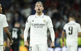epa10282143 Real Madrid's midfielder Fede Valverde celebrates after scoring the 5-0 goal during the UEFA Champions League group F soccer match between Real Madrid and Celtic Glasgow held at Santiago Bernabeu stadium in Madrid, Spain, 02 November 2022.  EPA/JUANJO MARTIN