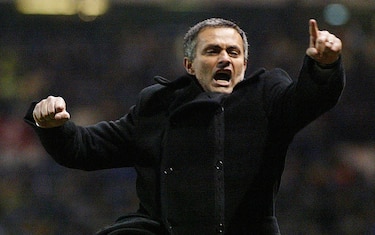 FC Porto manager Jose Mourinho celebrates his teams 1-1 draw and progression to the quarter finals after the UEFA Champions League match at Old Trafford, Manchester. 02/06/2004: Jose Mourinho who will be officially unveiled later Wednesday June 2, 2004, as Chelsea's new manager. Porto yesterday released the man who had guided them to Champions League glory from his contract after agreeing a compensation package.  THIS PICTURE CAN ONLY BE USED WITHIN THE CONTEXT OF AN EDITORIAL FEATURE. NO WEBSITE/INTERNET USE UNLESS SITE IS REGISTERED WITH FOOTBALL ASSOCIATION PREMIER LEAGUE.   (Photo by Martin Rickett - PA Images/PA Images via Getty Images)