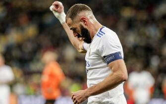 epa09532992 Real’s Karim Benzema reacts after Shakhtar scored the 1-0 own goal during the UEFA Champions League group D soccer match between Shakhtar Donetsk and Real Madrid in Kiev, Ukraine, 19 October 2021.  EPA/SERGEY DOLZHENKO