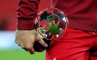 LIVERPOOL, ENGLAND - SEPTEMBER 15: Jordan Henderson of Liverpool poses for a photo with the player of the match award following the UEFA Champions League group B match between Liverpool FC and AC Milan at Anfield on September 15, 2021 in Liverpool, England. (Photo by Alex Livesey - UEFA/UEFA via Getty Images)