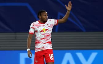 epa09562067 Leipzig's Christopher Nkunku reacts after scoring the 1-0 during the UEFA Champions League group A soccer match between  RB Leipzig and Paris Saint-Germain (PSG) in Leipzig, Germany, 03 October 2021.  EPA/FILIP SINGER