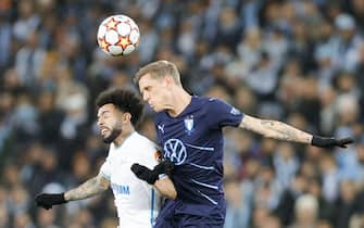 MALMO, SWEDEN - NOVEMBER 23, 2021: Zenit's Claudinho (L) and Malmo's Soren Rieks head the ball in the 2021/22 UEFA Champions League Group H Round 5 match between Malmo FF and Zenit St Petersburg at Eleda Stadion. Mikhail Japaridze/TASS/Sipa USA