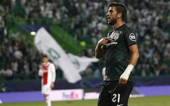 epa09470493 Sporting player Paulinho celebrates after scoring a goal against Ajax during their UEFA Champions League Group C soccer match at Jose Alvalade Stadium in Lisbon, Portugal, 15 September 2021.  EPA/ANTONIO COTRIM