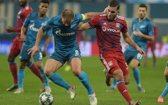 Zenit St. Petersburg's Serbian defender Branislav Ivanovic and Lyon's French forward Rayan Cherki vie for the ball during the UEFA Champions League group G football match between Zenit and Lyon at the Gazprom Arena in Saint Petersburg on November 27, 2019. (Photo by Olga MALTSEVA / AFP) (Photo by OLGA MALTSEVA/AFP via Getty Images)