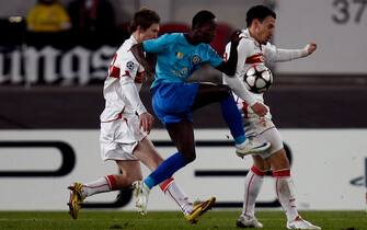 STUTTGART, GERMANY - DECEMBER 09: Antonio Semedo (C) of Unirea is challenged by Aliaksandr Hleb (L) and Timo Gebhart (R) of Stuttgart during the UEFA Champions League Group G match between VfB Stuttgart and Unirea Urziceni at the Mercedes-Benz Arena on December 9, 2009 in Stuttgart, Germany.  (Photo by Alex Grimm/Bongarts/Getty Images)