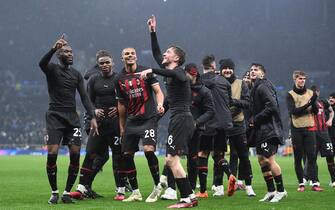 epa10510526 AC Milan players celebrate at the end of the UEFA Champions League, Round of 16, 2nd leg match between Tottenham Hotspur and AC Milan in London, Britain, 08 March 2023.  EPA/Andy Rain