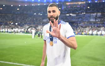Real Madrid's Karim Benzema celebrating with trophy after UEFA Champions League final match between Liverpool FC and Real Madrid at Stade de France in Saint-Denis, north of Paris, France on May 28, 2022. Photo by Christian Liewig/ABACAPRESS.COM