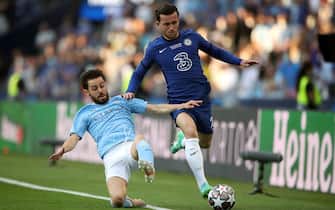 Chelsea&#x92;s Ben Chilwell (right) and Manchester City's Bernardo Silva battle for the ball during the UEFA Champions League final match held at Estadio do Dragao in Porto, Portugal. Picture date: Saturday May 29, 2021.