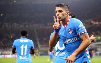 Luis Suarez of Atletico Madrid  celebrates after scoring his team's second goal during the Uefa Champions League Group B  match between Ac Milan and Atletico Madrid at Stadio Giuseppe Meazza on September 28, 2021 in Milan, Italy .