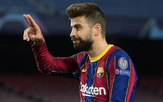 Barcelona's Spanish defender Gerard Pique celebrates his goal during the UEFA Champions League group G football match between Barcelona and Dynamo Kiev at the Camp Nou stadium in Barcelona, on November 4, 2020. (Photo by LLUIS GENE / AFP) (Photo by LLUIS GENE/AFP via Getty Images)