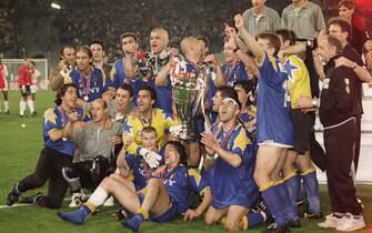 612547974 Juventus players celebrate with the trophy after they won the 1996 UEFA Champions League final against Ajax Amsterdam. 1-1 (a.e.t) 4-2 (penalties). (Photo by Christian Liewig/TempSport/Corbis via Getty Images)