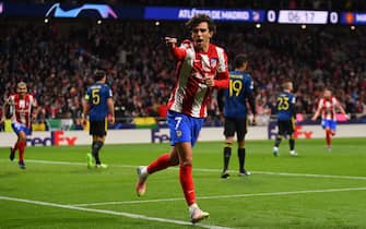 MADRID, SPAIN - FEBRUARY 23: Joao Felix of Atletico Madrid celebrates after scoring their team's first goal during the UEFA Champions League Round Of Sixteen Leg One match between Atletico Madrid and Manchester United at Wanda Metropolitano on February 23, 2022 in Madrid, Spain. (Photo by Denis Doyle - UEFA/UEFA via Getty Images)