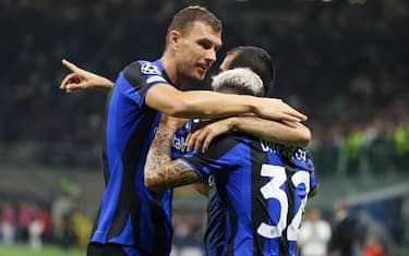 Inter Milan’s Edin Dzeko (L)  jubilates with his teammate Federico Dimarco  after scoring goal of 2 to 0 during the UEFA Champions League Group C  match  between FC Inter  and  Fc Viktoria Plzen  at Giuseppe Meazza stadium in Milan, 26  October 2022.
ANSA / MATTEO BAZZI

