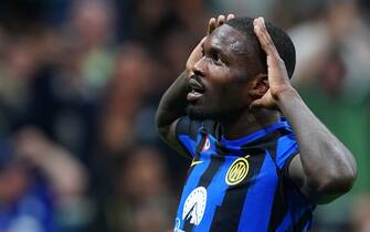 Foto Spada/LaPresse 03 Ottobre 2023 - Milano  , Italia - sport, calcio - Fc Inter Vs Benfica - Champions League 2023/2024 - Stadio San Siro Nella foto: Marcus Thuram (FC Inter); esultanza dopo gol 1-0

October 03 , 2023 Milan  , Italy - sport, calcio - Fc Inter Vs Benfica - Champions League 2023/2024  - San Siro Stadium . In the pic : Marcus Thuram (FC Inter);  celebrates after scoring 1-0