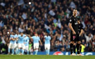 epa05256122 Zlatan Ibrahimovic of Paris Saint Germain rects after Manchester City scored during the UEFA Champions League quarter final, second leg soccer match between Manchester City and Paris Saint-Germain in Manchester, Britain, 12 April 2016.  EPA/NIGEL RODDIS