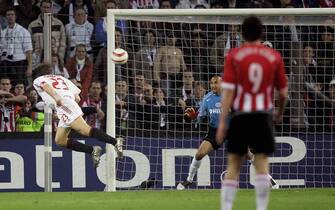 EINDHOVEN, NETHERLANDS - MAY 4:  Massimo Ambrosini of Milan scores the goal that took his team to the final during the champions league semi final second Leg match between PSV Eindhoven and AC Mailand at the Philips Stadium on May 4, 2005 in Eindhoven, Netherlands. (Photo by Lars Baron/Bongarts/Getty Images)