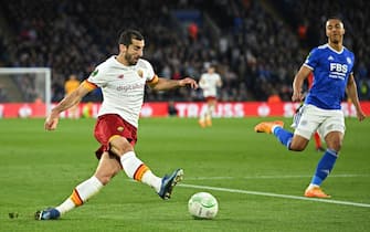 Roma's Armenian midfielder Henrikh Mkhitaryan crosses the ball during the UEFA Conference League semi-final first leg football match between Leicester City and Roma at King Power Stadium, in Leicester, on April 28, 2022. (Photo by Oli SCARFF / AFP) (Photo by OLI SCARFF/AFP via Getty Images)