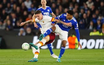 Roma's Lorenzo Pellegrini (left) and Leicester City's James Justin battle for the ball during the UEFA Europa Conference League semi-final, first leg match at the King Power Stadium, Leicester. Picture date: Thursday April 28, 2022.