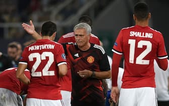 Manchester United's Portuguese manager Jose Mourinho (C) gives his instructions to Manchester United's Armenian midfielder Henrikh Mkhitaryan (L) during the UEFA Super Cup football match between Real Madrid and Manchester United on August 8, 2017, at the Philip II Arena in Skopje. / AFP PHOTO / Nikolay DOYCHINOV        (Photo credit should read NIKOLAY DOYCHINOV/AFP via Getty Images)