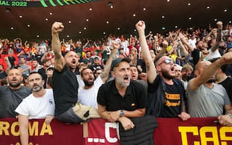 Roma supporters cheer before the start of the UEFA Europa Conference League final football match between AS Roma and Feyenoord at the Air Albania Stadium in Tirana on May 25, 2022. (Photo by Gent Shkullaku / AFP) (Photo by GENT SHKULLAKU/AFP via Getty Images)