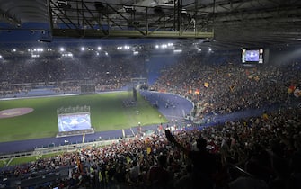 As Roma's supporters at the Olimpico Stadium to follow Conference League final match As Roma - Feyenoord on the screens set on the pitch, in Rome, Italy, 25 May 2022. ANSA/CLAUDIO PERI