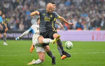 Feyenoord's Gernot Trauner and Marseille's Pol Lirola during the europa conference league soccer match between Marseille and Feyenoord Rotterdam at the Stade Velodrome in Marseille, Thursday, May 5, 2022