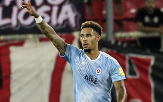 epa10106422 Slovan Bratislava's Andre Green reacts after scoring the 0-1 during the UEFA Europa League third qualifying round, 1st leg soccer match between Olympiacos Piraeus and Slovan Bratislava in Piraeus, Greece, 4 August 2022.  EPA/PANAGIOTIS MOSCHANDREOU