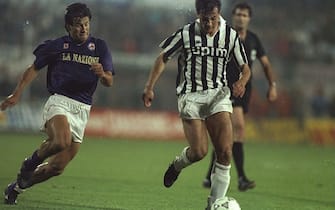 16 May 1990:  Gianluigi Casiraghi (centre) of Juventus is put under pressure by Dunga (left) of Fiorentina during the UEFA Cup Final second leg match in Avellino, Italy. The match ended in a 0-0 draw but Juventus won 3-1 on aggregate. \ Mandatory Credit:Simon  Bruty/Allsport