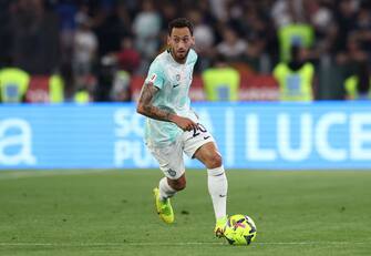 ROME, ITALY - MAY 24: Hakan Calhanoglu of FC Internazionale in action, runs with the ball during the Coppa Italia Final match between ACF Fiorentina and FC Internazionale at Stadio Olimpico on May 24, 2023 in Rome, Italy. (Photo by Francesco Scaccianoce - Inter/Inter via Getty Images)