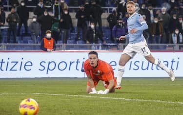 Udinese's Marco Silvestri, Lazio’s Ciro Immobile, during the Italian Cup Round of 16 soccer match between Lazio and Udinese at the Olimpico stadium in Rome, 18 January 2022. ANSA/FABIO FRUSTACI