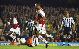 LONDON - SEPTEMBER 26:  Thierry Henry of Arsenal scores from a penalty during the FA Barclaycard Premiership match between Arsenal and Newcastle United at Highbury on September 26, 2003 in London. (Photo by Jamie McDonald/Getty Images)