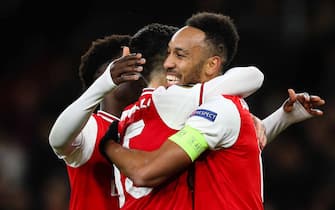 LONDON, ENGLAND - NOVEMBER 28: Pierre-Emerick Aubameyang of Arsenal celebrates with team mate Gabriel Martinelli after scoring the opening goal during the UEFA Europa League group F match between Arsenal FC and Eintracht Frankfurt at Emirates Stadium on November 28, 2019 in London, United Kingdom. (Photo by Craig Mercer/MB Media/Getty Images)