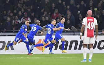 Getafe's Spanish forward Jaime Mata (2nd-R) celebrates with teammates after scoring a goal during the UEFA Europa League round of 32 second leg football match between Ajax Amsterdam and Getafe FC at the Johan Cruijff Arena stadium in Amsterdam on February 27, 2020. (Photo by JOHN THYS / AFP) (Photo by JOHN THYS/AFP via Getty Images)