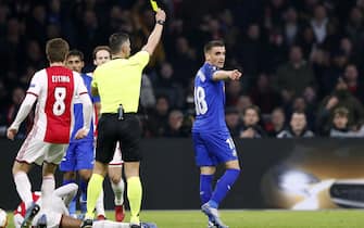 (l-r) Carel Eiting of Ajax, referee Tasos Sidiropoulos, Mauro Arambarri of Getafe CF during the UEFA Europa League round of 32 second leg match between Ajax Amsterdam and Getafe CF at Johan Cruijff Arena on February 27, 2020 in Amsterdam, The Netherlands(Photo by ANP Sport via Getty Images)