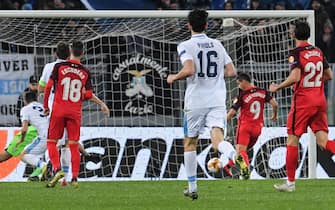 Sevilla's French forward Wissam Ben Yedder (2ndR Rear) kicks the ball to open the scoring during the UEFA Europa League round of 16 first leg football match Lazio Roma vs Sevilla on February 14, 2019 at the Olympic stadium in Rome. (Photo by Tiziana FABI / AFP)        (Photo credit should read TIZIANA FABI/AFP via Getty Images)