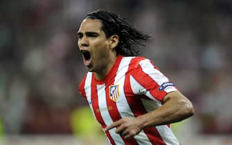 Atletico Madrid's Colombian forward Radamel Falcao celebrates after scoring a goal during the UEFA Europa League final football match between Club Atletico Madrid and Athletic Club Bilbao on May 9, 2012 at the National Arena stadium in Bucharest. AFP PHOTO / RAFA RIVAS        (Photo credit should read RAFA RIVAS/AFP/GettyImages)