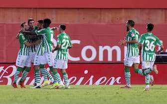 epa09414125 Betis´ players celebrate a score during the Spanish LaLiga soccer match between RCD Mallorca and Real Betis at San Moix stadium in Palma de Mallorca, Balearic Islands, Spain, 14 August 2021.  EPA/CATI CLADERA