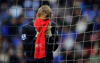 WIGAN, ENGLAND - MAY 15:  Robert Green of West Ham United looks dejected during the Barclays Premier League match between Wigan Athletic and West Ham United at the DW Stadium on May 15, 2011 in Wigan, England.  (Photo by Clive Mason/Getty Images)