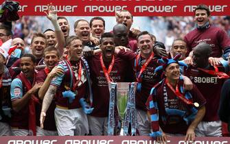 West Ham United players celebrate with the Championship Play-Off Trophy   (Photo by Nick Potts/PA Images via Getty Images)