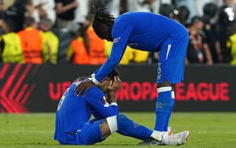 Rangers players Calvin Bassey (right) and Connor Goldson are dejected after losing the penalty shoot out following the UEFA Europa League Final at the Estadio Ramon Sanchez-Pizjuan, Seville. Picture date: Wednesday May 18, 2022. (Photo by Andrew Milligan/PA Images via Getty Images)