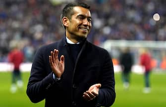 Rangers manager Giovanni van Bronckhorst celebrates victory after the final whistle in the UEFA Europa League semi-final, second leg match at Ibrox Stadium, Glasgow. Picture date: Thursday May 5, 2022.